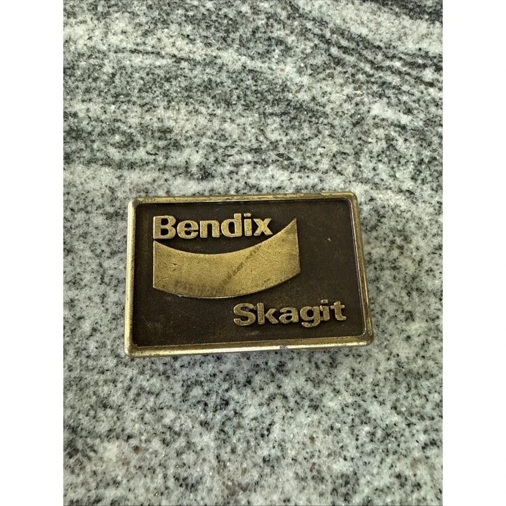 brass‎ belt buckle logos Bendix Corporation and Skagit Car Brake Equipment 1978
